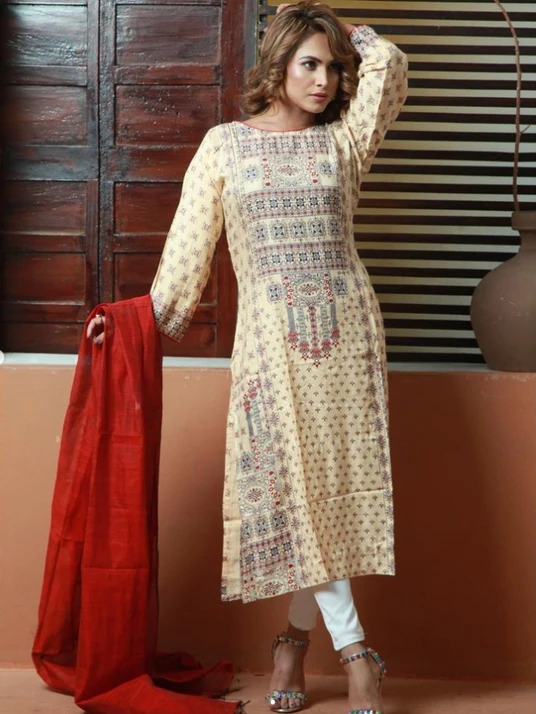 Fashion portrait in a cream dress