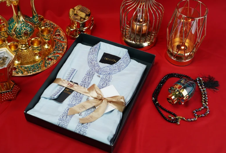 Product photograph styled with rich red fabric and jewellery
